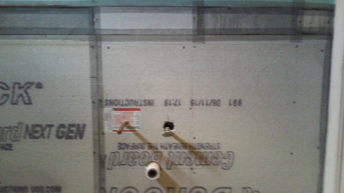 Not the cleanest cut outs for the plumbing. 